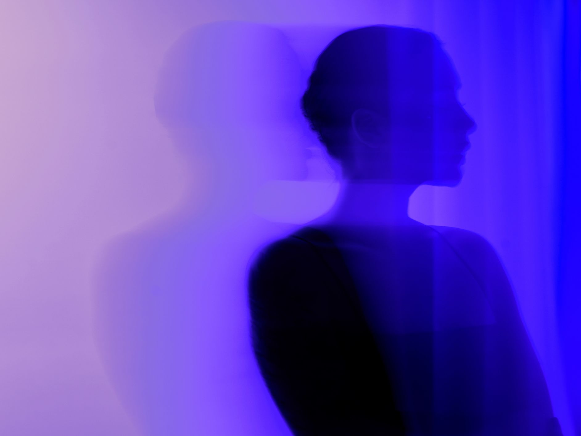 Image may contain Silhouette Purple Lighting Person Light and Head
