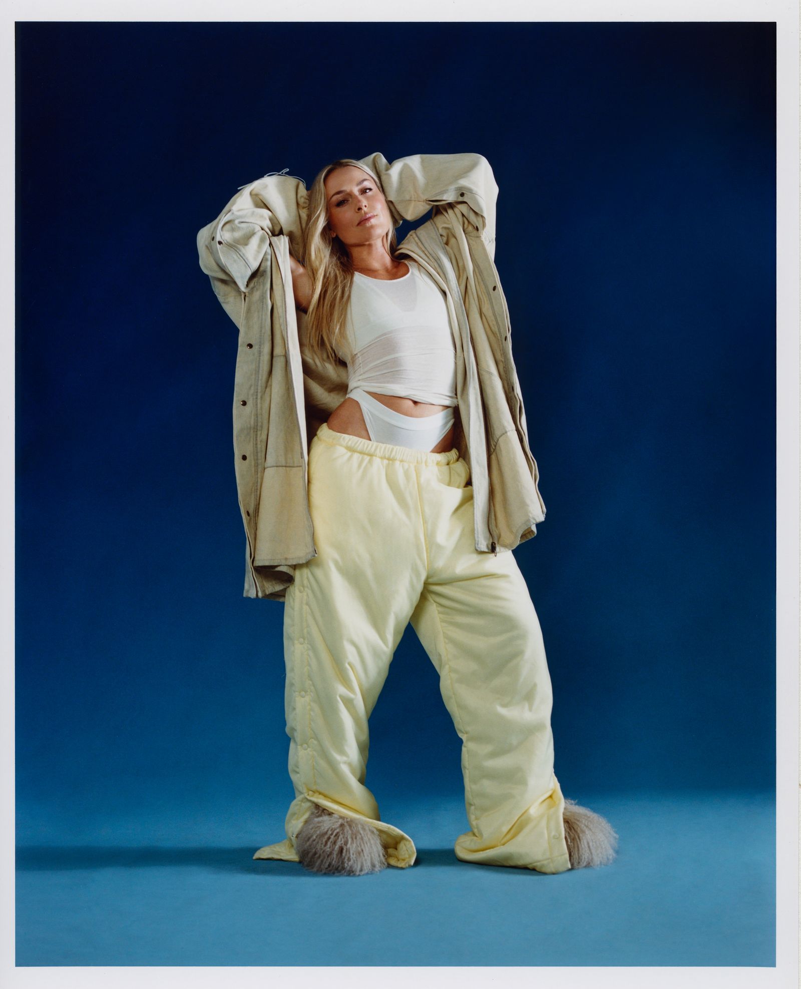 Image may contain Lindsey Vonn Adult Person Clothing Coat Costume and Pants