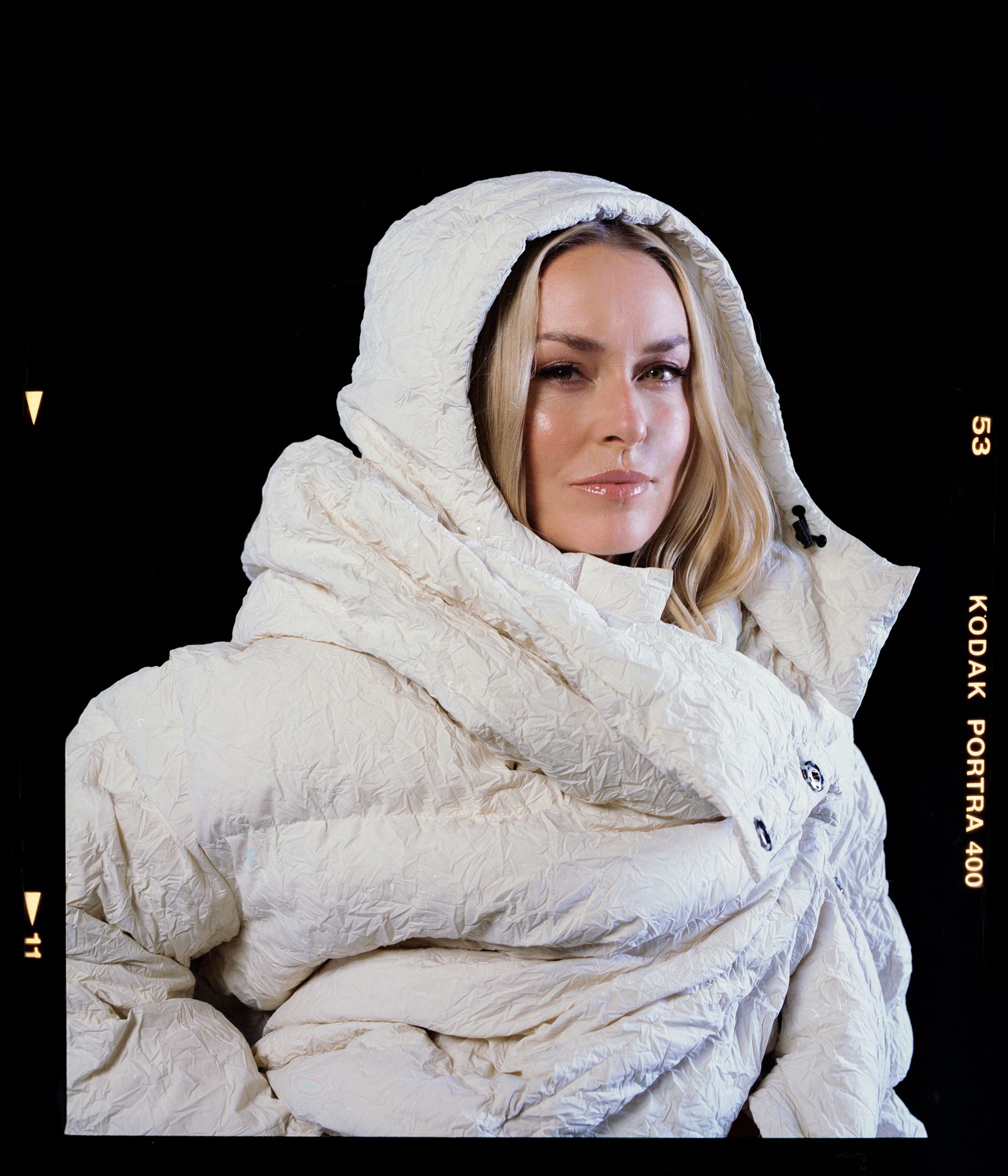 Image may contain Lindsey Vonn Blanket Adult Person Face Head Photography Portrait Clothing and Hood